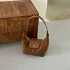 2026 Nova Bolsa Casual Retro de Ombro Único Grande Capacidade Bolsa Bolinho Moda Versátil Bolsa Transversal