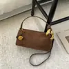 2025 Nova Bolsa de Mão de Alta Qualidade com Textura, Moda Versátil, Tendência, Nicho para Mulheres, Bolsa de Ombro Simples Casual, Bolsa Transversal