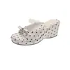 Sandalias de cuña con lazo en stock para mujer 2026 Nuevas de verano Versátiles de suela gruesa para aumentar altura Estilo de hada Sandalias