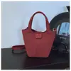 Bolsas Populares Deste Ano para Mulheres 2025 Nova Bolsa de Ombro Transversal Design de Nicho Bolsa Carteiro Bolsa Saco Bolsa de Ombro Retro para o Dia a Dia