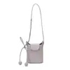 Bolsa Pequena Quadrada Tecida Transfronteiriça Feminina Nova Moda Primavera 2026 Versátil Bolsa Saco Grande Capacidade Bolsa de Mão Bolsa Transversal