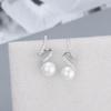 Aretes de botón de plata esterlina s925 estilo coreano transfronterizo con perla de agua dulce, moda para mujer, aretes simples retorcidos, fabricante de soportes vacíos DIY