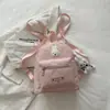 2026 Nueva Mochila Linda de Conejo para Niñas Estudiantes Bolsa Escolar Ligera Versátil Mochila de Dibujos Animados Moda Femenina Tendencia