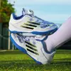Nuevos zapatos de fútbol bajos para niños con botones giratorios, diseño sin cordones, adecuados para entrenamiento de fútbol sala y correr