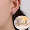 Pendientes de Flor de Cinco Pétalos y Gota de Agua de Circonita Pequeña Flor Europeos y Americanos Puros y Frescos Exquisitos Versátiles Nicho Temperamento Lujo Ligero Pendiente para el Trabajo