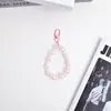 Nuevo llavero de cadena de cuentas de flor pequeña de acrílico de colores para coche, accesorio de flor de cinco pétalos chapado, decoración para funda de auriculares