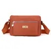 Bolsa Transversal Chi Bao Feminina Verão 2024 Nova Multibolsos Impermeável Tecido de Nylon Bolsa de Ombro Simples Moda Transfronteiriça