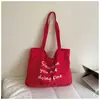 Nova Bolsa de Lona com Letras Estilo Coreano 2026 para Mulheres, Bolsa de Ombro Casual de Grande Capacidade, Bolsa Tote de Compras para Estudantes Universitários
