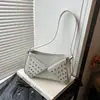 Bolso de mano popular transfronterizo para mujer, bolso baguette casual de moda de verano 2026, bolso de hombro y bandolera