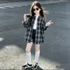 Camisa a Cuadros para Niña 2026 Otoño Nuevo Estilo Niños Medianos y Grandes Casual Camisa de Solapa Principios de Otoño Top de Manga Larga Cárdigan para Niños