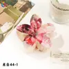 Nuevo Clip de Huevo con Flores Qiyue Moda Impresión UV Pasador de Orquídea Florale Clip de Tiburón Creativo Europeo y Americano
