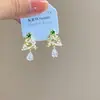 ¡Atmósfera Navideña! Pendientes de Árbol de Navidad con Borlas Nicho Gama Alta Elegantes Mejor Amiga Regalo Nuevo Clip para Oreja para Mujer