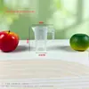 Taza medidora de plástico de fábrica con escala, adecuada para tiendas de té de burbujas y repostería, hecha de material de PC engrosado con tapa, disponible en varios tamaños, resistente a altas temperaturas, taza transparente
