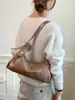 Bolsa de ombro sob o braço em couro macio de alta qualidade para mulheres, nova coleção primavera-verão 2026, bolsa transversal simples e versátil para o dia a dia, estilo bolinho