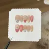 TaoxiliGelatina de Leche Lenguaje de las FloresY Estilo Europeo y Americano Rosa Nude Corto Forma de Gota Franceses 3D Tallados Hechos a Mano Uñas Postizas