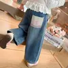 Pantalones de papá de dibujos animados para niños, nuevos de otoño transfronterizos 2026, versión coreana, jeans escolares para niñas, ropa infantil, moda al por mayor