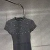 2026 Otoño Temprano Nuevo Estilo Lleno de Estrellas Perla Pedrería Caliente Suéter Ajustado Cuello Semi Alto Manga Corta Top Favorecedor