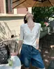 Top de punto estilo retro con mangas abullonadas, botones de perla multicolor, nueva camiseta base fina de verano con cuello en V, adelgazante para mujer