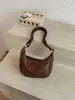 Bolsa feminina casual de grande capacidade para comércio exterior no atacado, nova bolsa simples retrô estilo bolinho, bolsa de ombro transversal versátil para o dia a dia