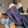 Shorts casuales de verano para hombre, marca moderna de seda helada, transpirables, de secado rápido, finos, holgados, estilo callejero, deportivos, para correr, shorts de playa