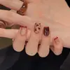 Uñas Postizas de Xiaohongshu Populares Efecto Blanqueador Ojo de Gato Caramelo Maillard Cortas Desmontables Sencillas Fuente Mayorista