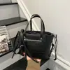 Bolso Tote de Hombro Cruzado Versátil de Moda Exquisita de Gama Alta Transfronterizo Diseño de Nicho para Viajes de Verano 2026