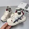 Zapatillas infantiles 2026 nuevas suela blanda velcro malla transpirable color retro bloques de color ligeras versátiles casual