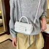 Bolso pequeño retro para mujer, nueva colección de verano 2026, bolso de hombro versátil, bolso cruzado, estilo transfronterizo, con acabado similar al cuero encerado, bolso cuadrado pequeño