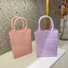 2025 Verano Nuevo Bolso de Gelatina de PVC Bolso de Mano a Cuadros Vertical para Mujer Bolso de Gran Capacidad Casual Color Caramelo Bolsa de Compras