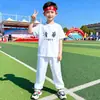 Temporada de Graduación de Jardín de Infancia y Escuela Primaria de la Universidad de Tsinghua y la Universidad de Pekín Camiseta Infantil Creativa de Manga Corta Atuendo Blanco de Actividad de Verano Moderno