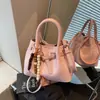 Bolsas Pequeñas de Moda Transfronterizas para Mujer 2026 Nuevo Bolso Cubo Versátil Bolso de Mano Super Popular Bolso Cruzado de Hombro