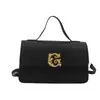 La popular de este año 2024 nueva moda simple bolsa cuadrada pequeña bolso de mano para grupos pequeños bolso de hombro cruzado de alta gama bolso de mujer