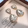 Moda Europea y Americana Lujo Ligero Nicho Gama Alta Temperamento Versátil Personalidad Exagerado Pendientes de Gota de Agua Venta al por Mayor