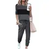 D9389 Venda quente na Amazon moda casual feminina europeia e americana cor sólida costura manga curta calça conjunto de duas peças