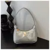 Bolsa Pequena Feminina Transfronteiriça Simples de Borboleta Novo Estilo PU Cor Sólida Versátil Bolsa de Ombro Leve Bolsa de Axila Atacado