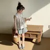 Conjunto de Niña 2026 Verano Nuevo Estilo: Elegante Conjunto de Dos Piezas para Niños con Top de Manga Corta Floral y Shorts