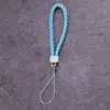 Lanyard para teléfono móvil al por mayor de fábrica, cordón para llavero de cámara de cuero PU, cuerda de muñeca para teléfono móvil de pareja, cuerda tejida de cuero
