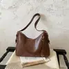 Bolso de mano retro de alta gama transfronterizo para mujer, gran capacidad, nuevo modelo 2026, bolso de hombro simple y versátil para compras y desplazamientos