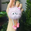 Explosiones de red creativa felpa piernas largas colgante bolita de carbón pequeño oreja de elfo bola de pelo llavero colgante de bolso regalo mayoreo
