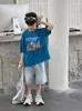 Tairu 2026 Nuevo Estilo de Verano Versión Coreana Camiseta Infantil de Algodón Puro Estampada de Dibujos Animados para Niños Transpirable de Manga Corta Top Moderno