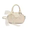 Bolso de Bowling de Moda de Nicho de Alta Apariencia para Mujer 2026 Nuevo Elegante Bolso de Hombro Cruzado con Relieve de Gama Alta