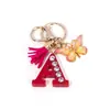 Llavero de Borla de Mariposa con Pedrería Transfronterizo con 26 Opciones de Letras, Colgante de Resina para Bolso, Accesorio de Regalo para Mejores Amigas