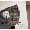 Bolsa de palha trançada artística bolsa transversal de moda verão bolsa de ombro único bolsa de mão bolsa de telefone trançada bolsa de praia