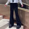 Pantalones acampanados negros de alta gama para hombre, marca moderna de estilo coreano, diseño exclusivo con patrón de cielo estrellado y salpicaduras de tinta, pantalones largos casuales de pierna ancha