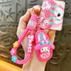 Melodía creativa chanclas giratorias llavero colgante bolso de mujer colgante llavero de coche máquina de garra regalo al por mayor