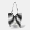 Bolsa de mano doble cara casual a rayas para mujer, nuevo modelo 2026, gran capacidad, bolso de hombro ligero, adecuado para estudiantes universitarios y para ir al trabajo