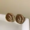 Pendientes Retro de Lujo Ligero Color Ámbar Café, Elegantes y de Nicho, con un Toque de Diseño de Alta Gama