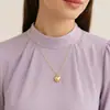 Collar con colgante de corazón de melocotón de aleación retro, exquisito y simple, con cadena de clip de papel creativo transfronterizo europeo y americano