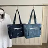 Bolsa de Ombro Tote Jeans Estampada Transfronteiriça 2026 com Laço Bordado de Grande Capacidade Nova Casual para o Dia a Dia Moda