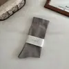 Calcetines sin costuras para mujer, engrosados y de caña alta para primavera y otoño, calcetines holgados para maternidad, calcetines holgados de color liso versátiles estilo japonés, calcetines largos Maillard